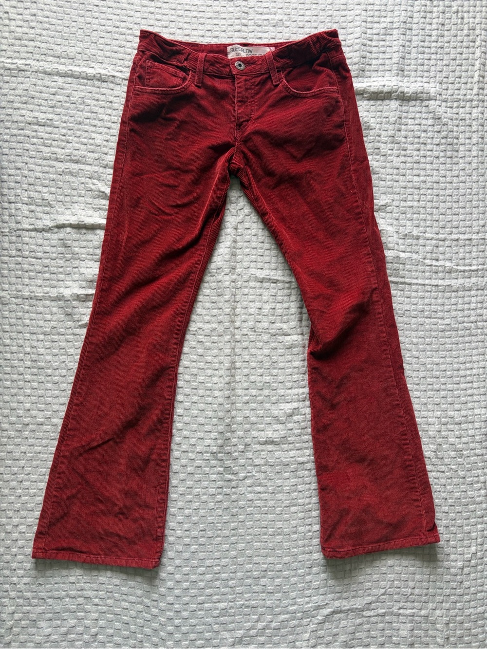 Levi’s red corduroy  flare low rise Jean